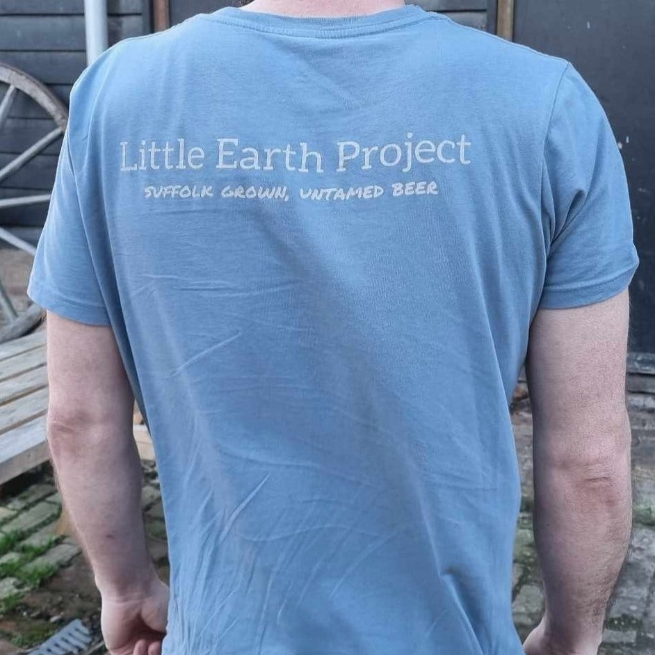 Organic cotton tshirt in sky blue with Little Earth Project and tagline across upper back. 